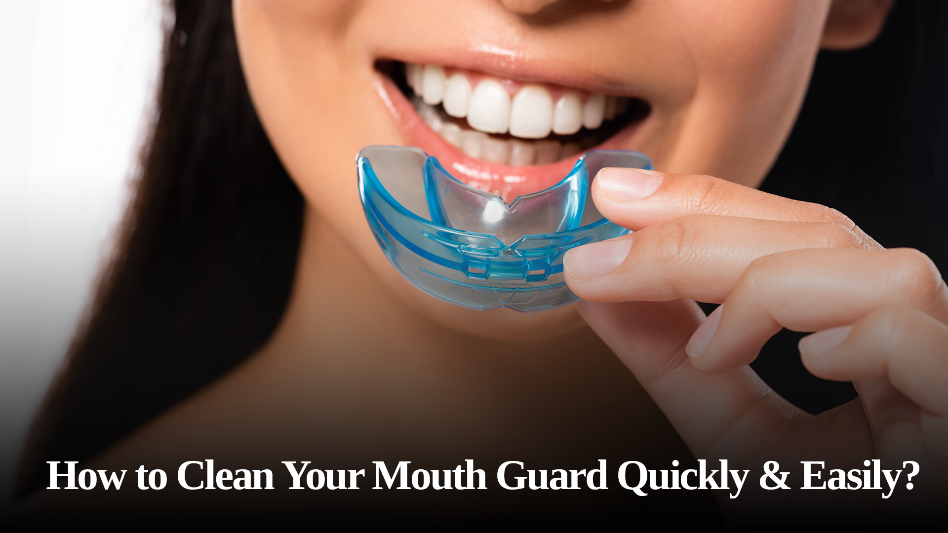 young man inserting mouthguard white background